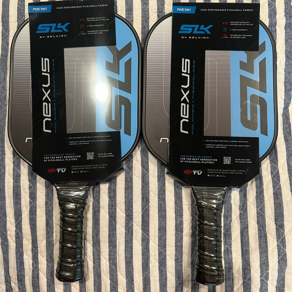 NWT Set of two Selkirk SLK Nexus Blue 8600
Pickleball Paddle - Black and Blue